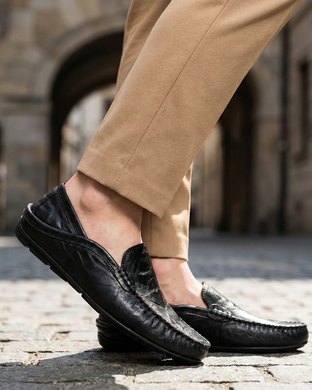 Unisex moc toe loafers with braided side trim and flat dark soles