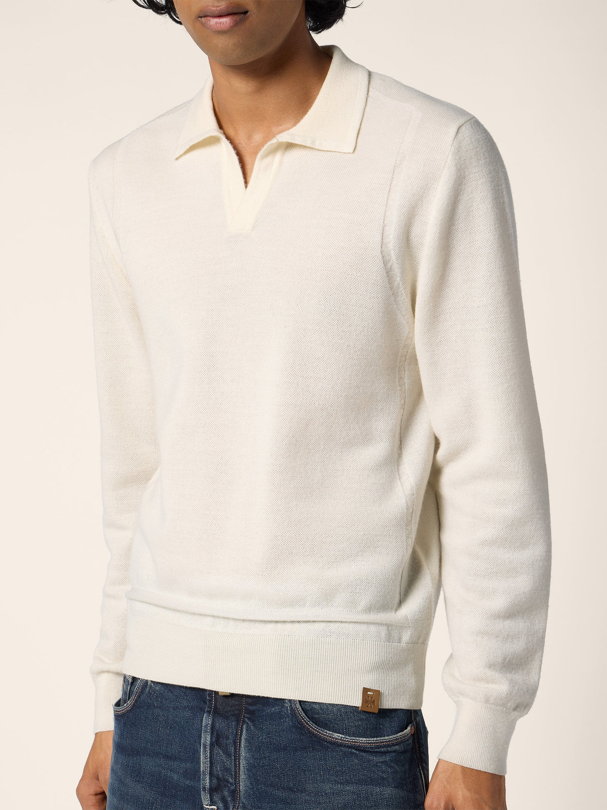 Men's cream long sleeve polo jumper with collared V-neck and ribbed trims