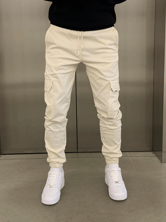 Men's tapered cargo trousers with drawstring waist, thigh pockets and elasticated cuffs
