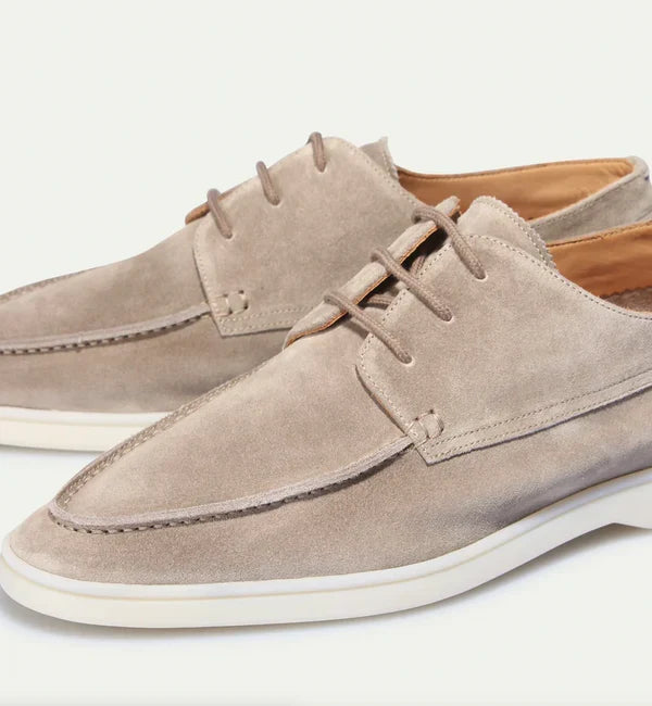 Men's lace-up loafers with moc toe stitching and contrasting sole