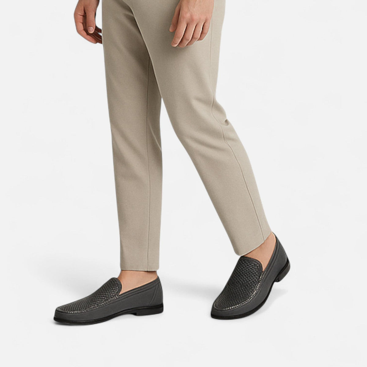 Men's perforated slip-on loafer with moc toe stitching and low heel