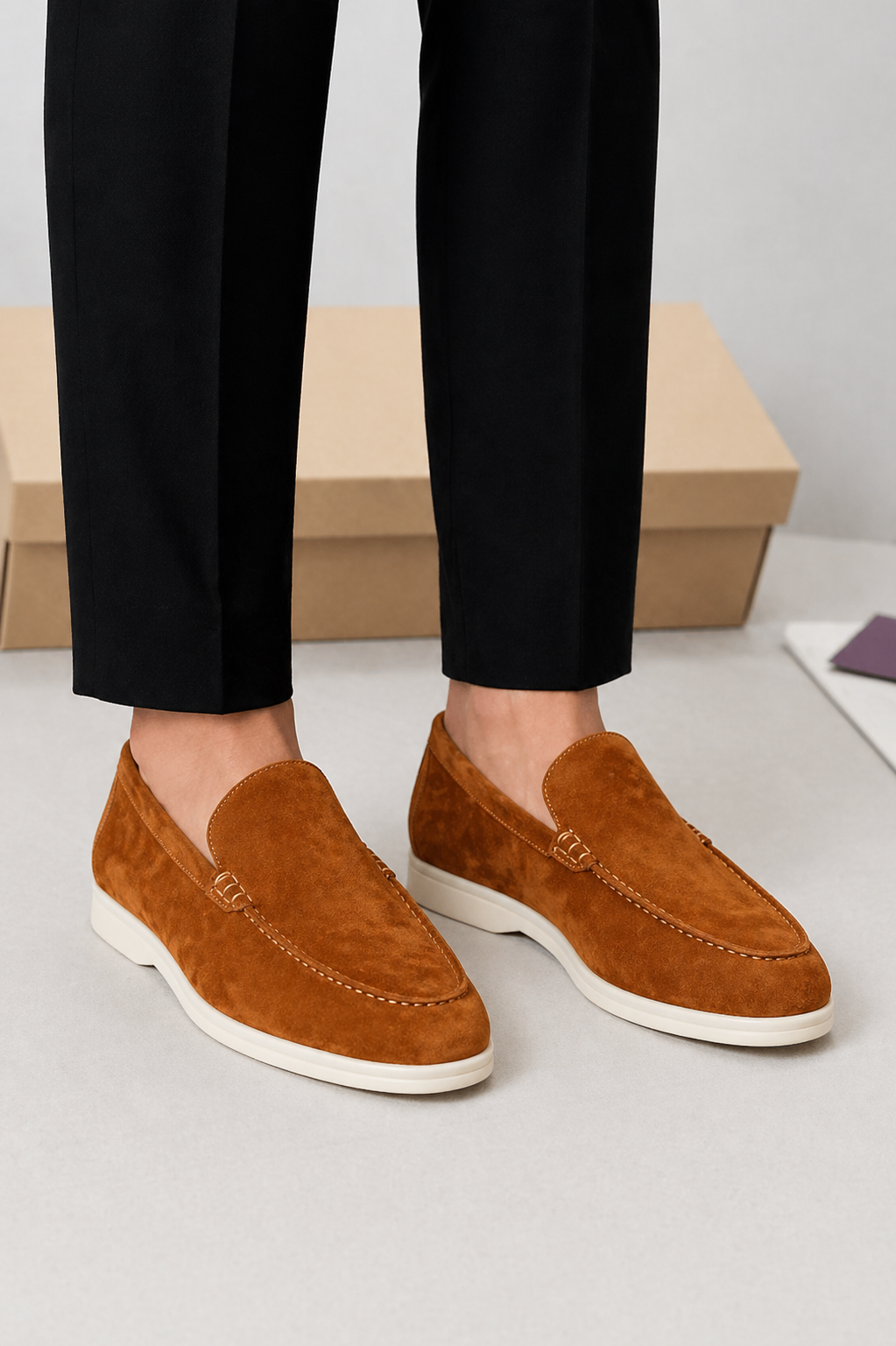 Men's slip-on loafers with moc toe stitching and low soles