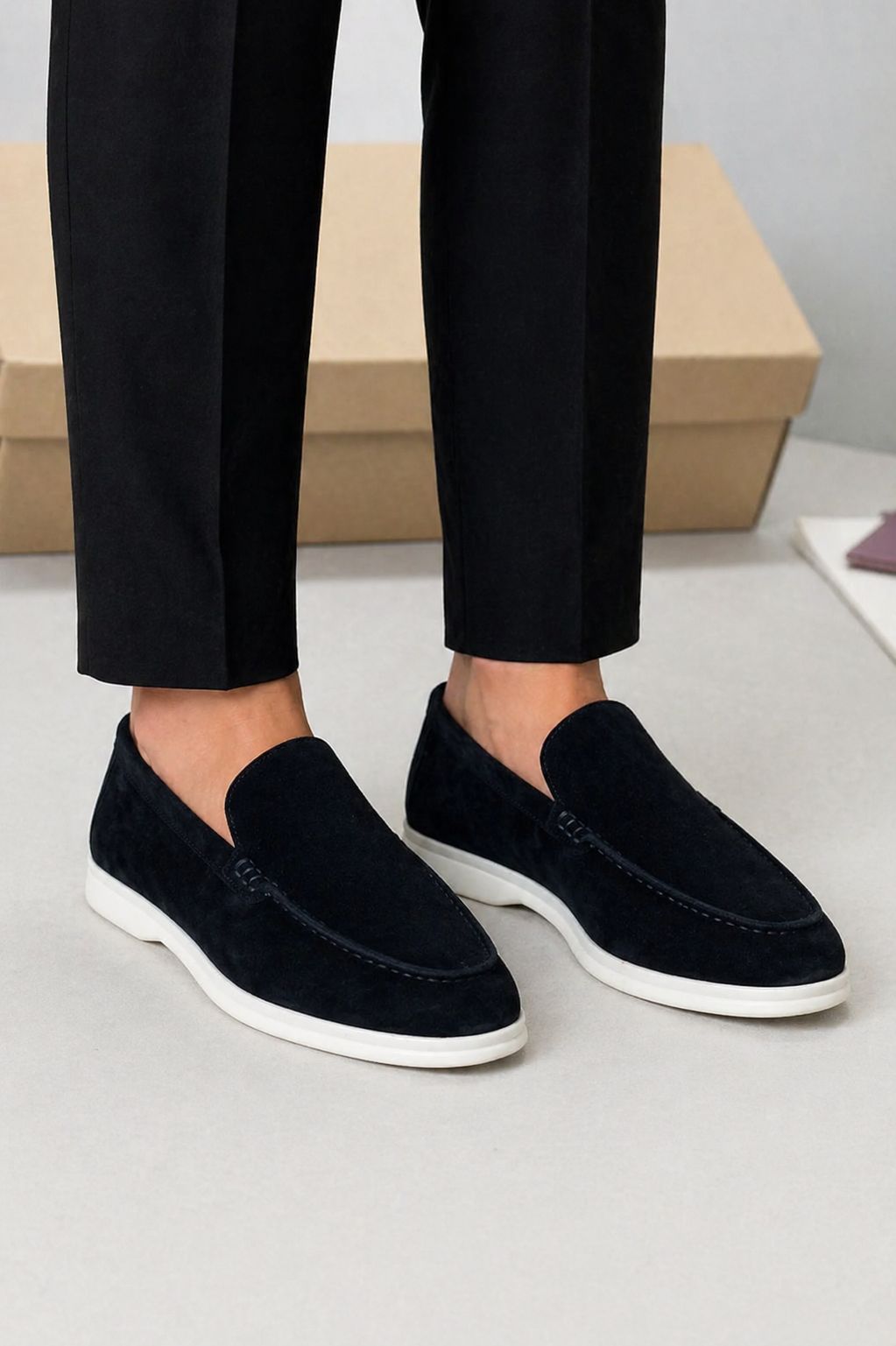 Men's slip-on loafers with moc toe stitching and low soles