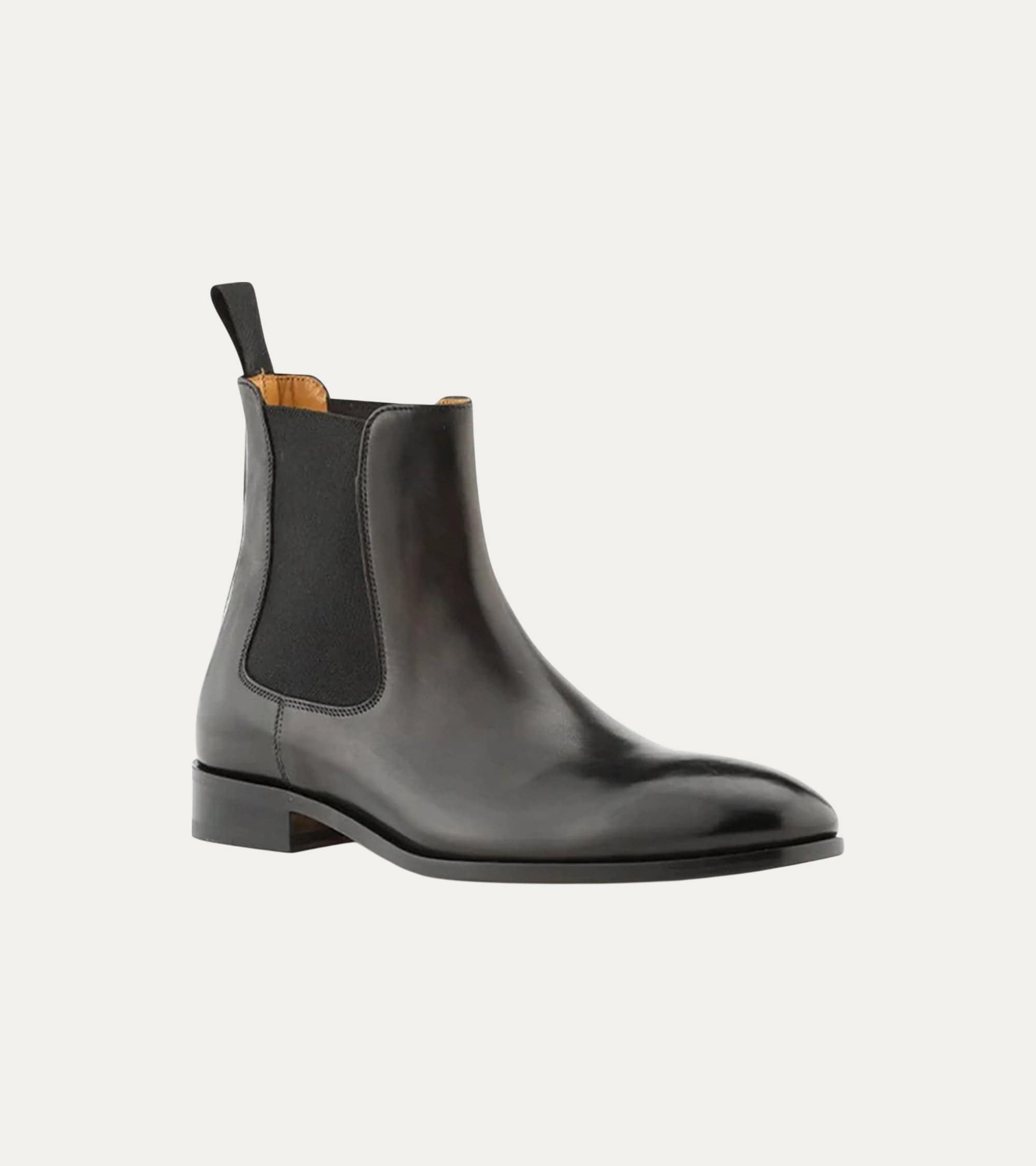 Black Chelsea boot with rounded toe and elastic side panels