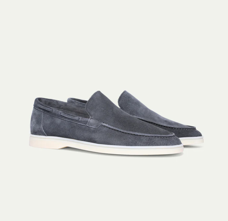 Men's slip-on loafers with moc-toe stitching and flat soles