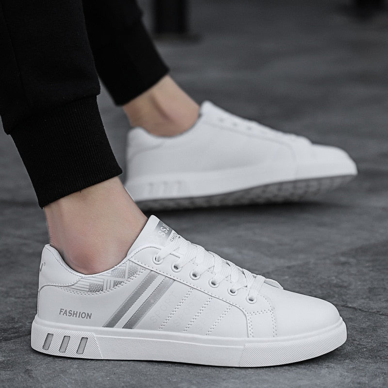 Men's lace-up sneakers with striped side details and flat soles
