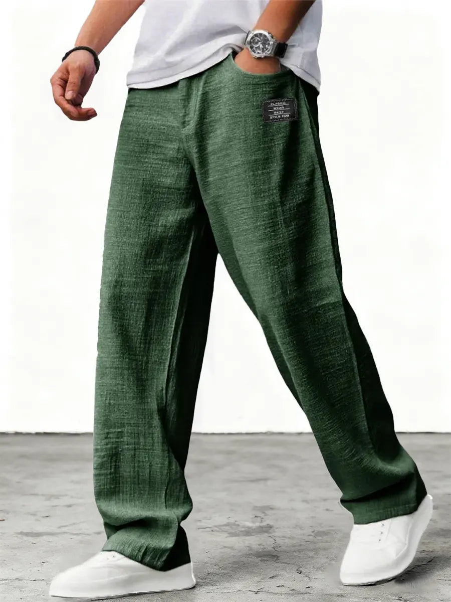 Men's relaxed fit wide leg summer trousers in blue with flat front waist and textured finish