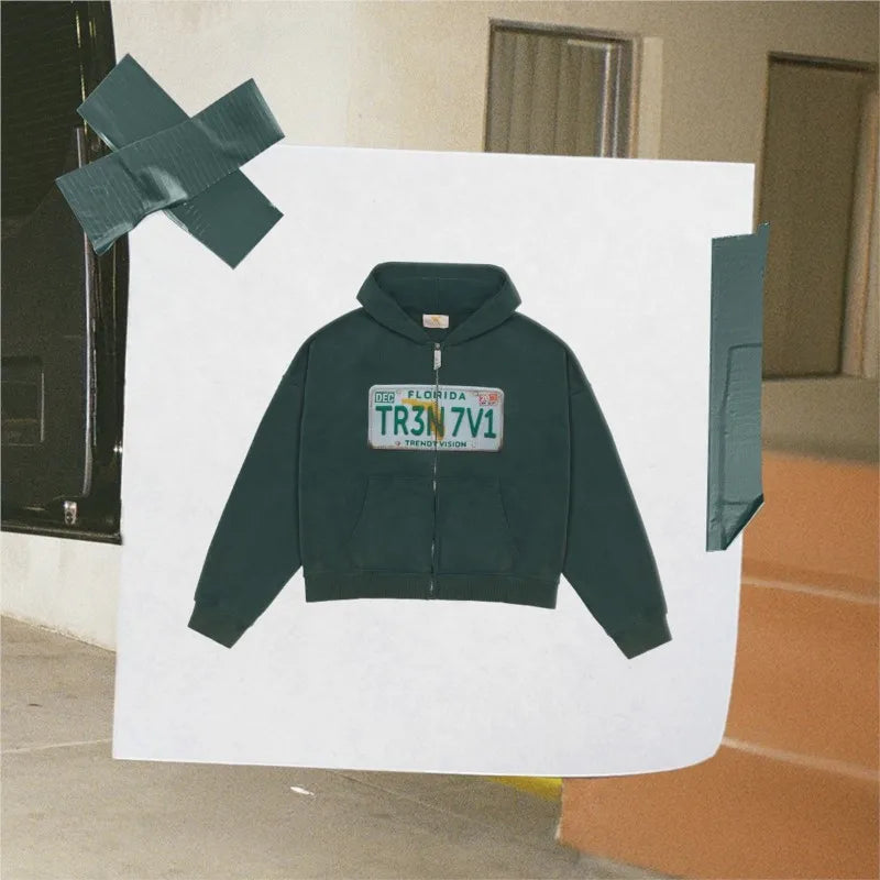 Cropped hooded zip hoodie with license plate chest graphic
