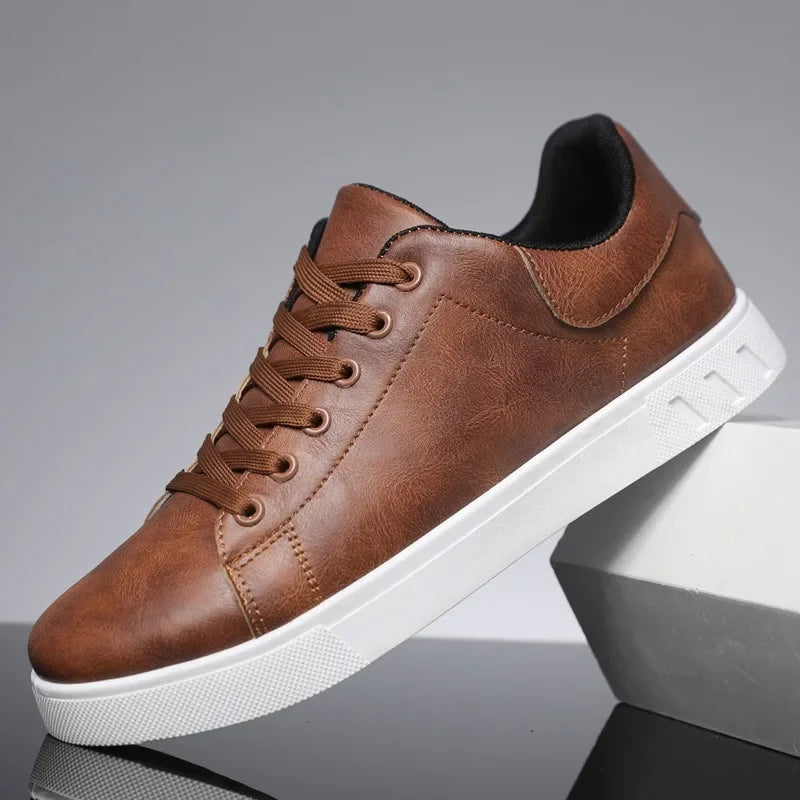 Men's low-top lace-up sneakers with round toe and flat white sole