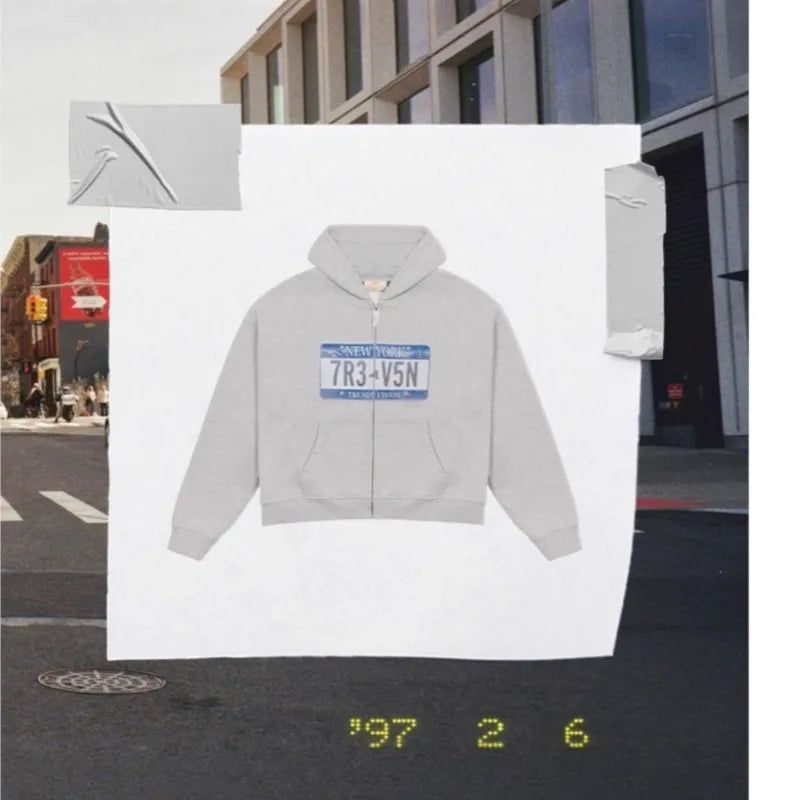 Cropped hooded zip hoodie with license plate chest graphic