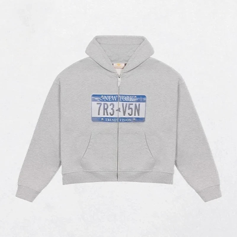 Cropped hooded zip hoodie with license plate chest graphic