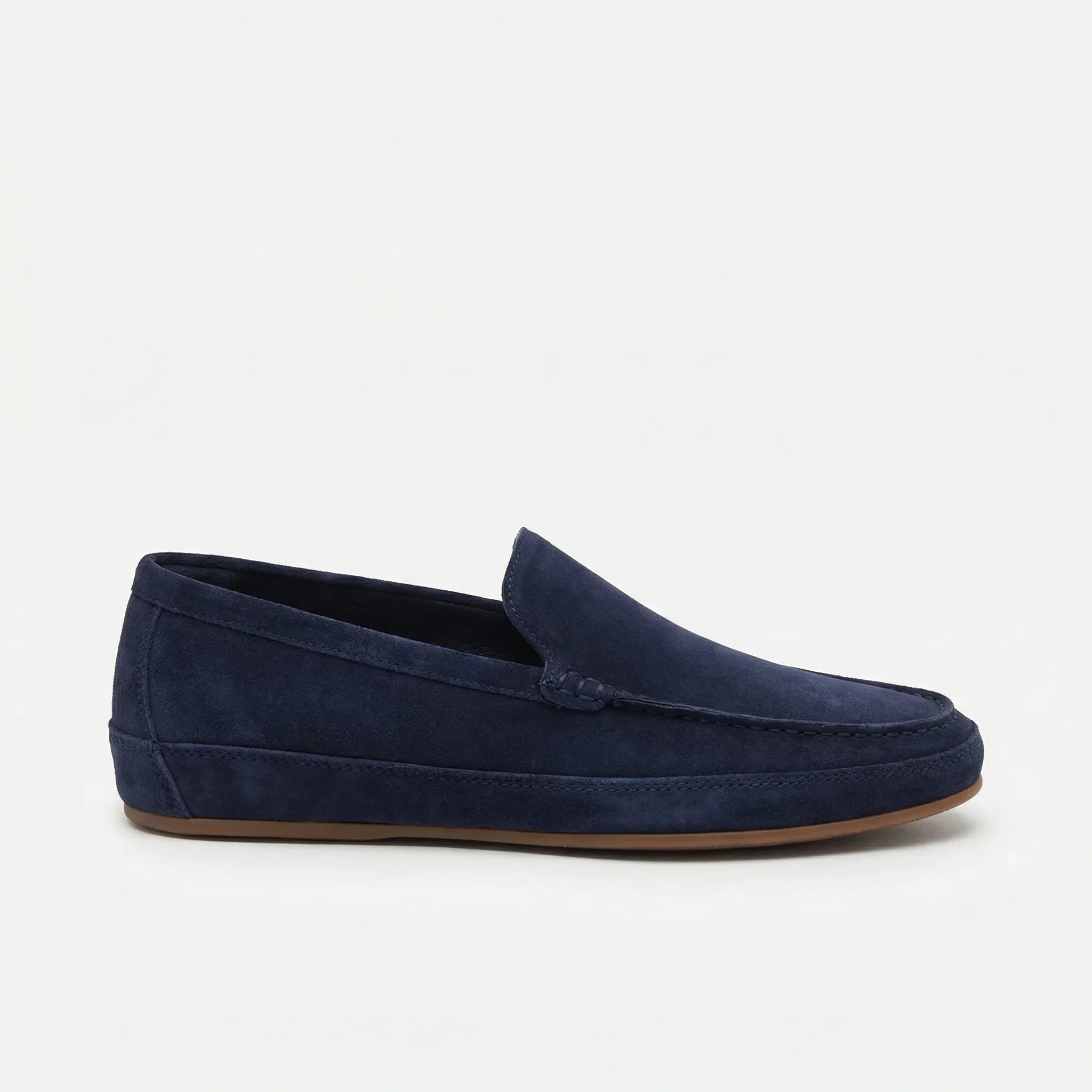 Men's slip-on moccasin loafers with stitched trim and ridged soles