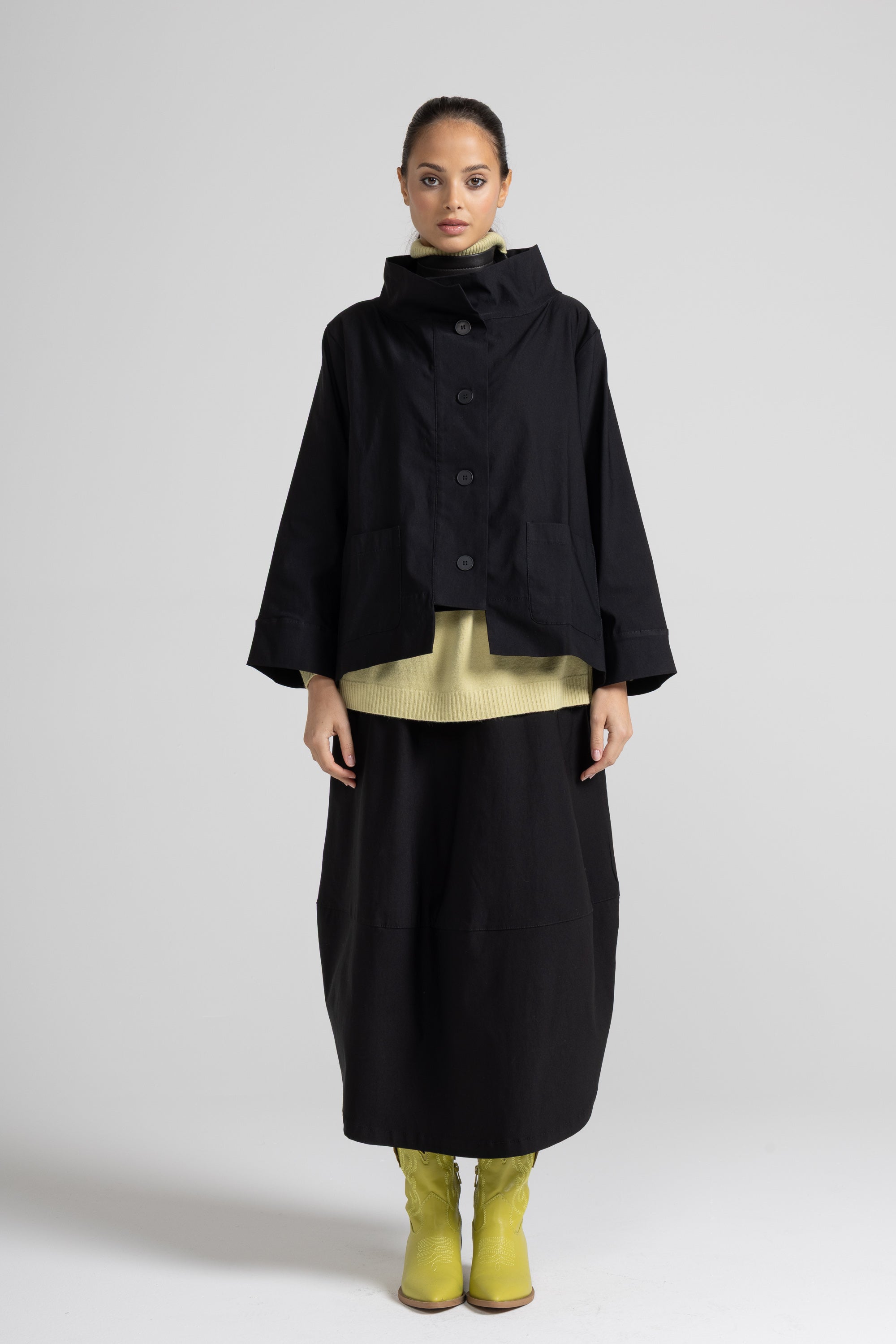 Women's navy asymmetric short jacket with long sleeves and button front closure