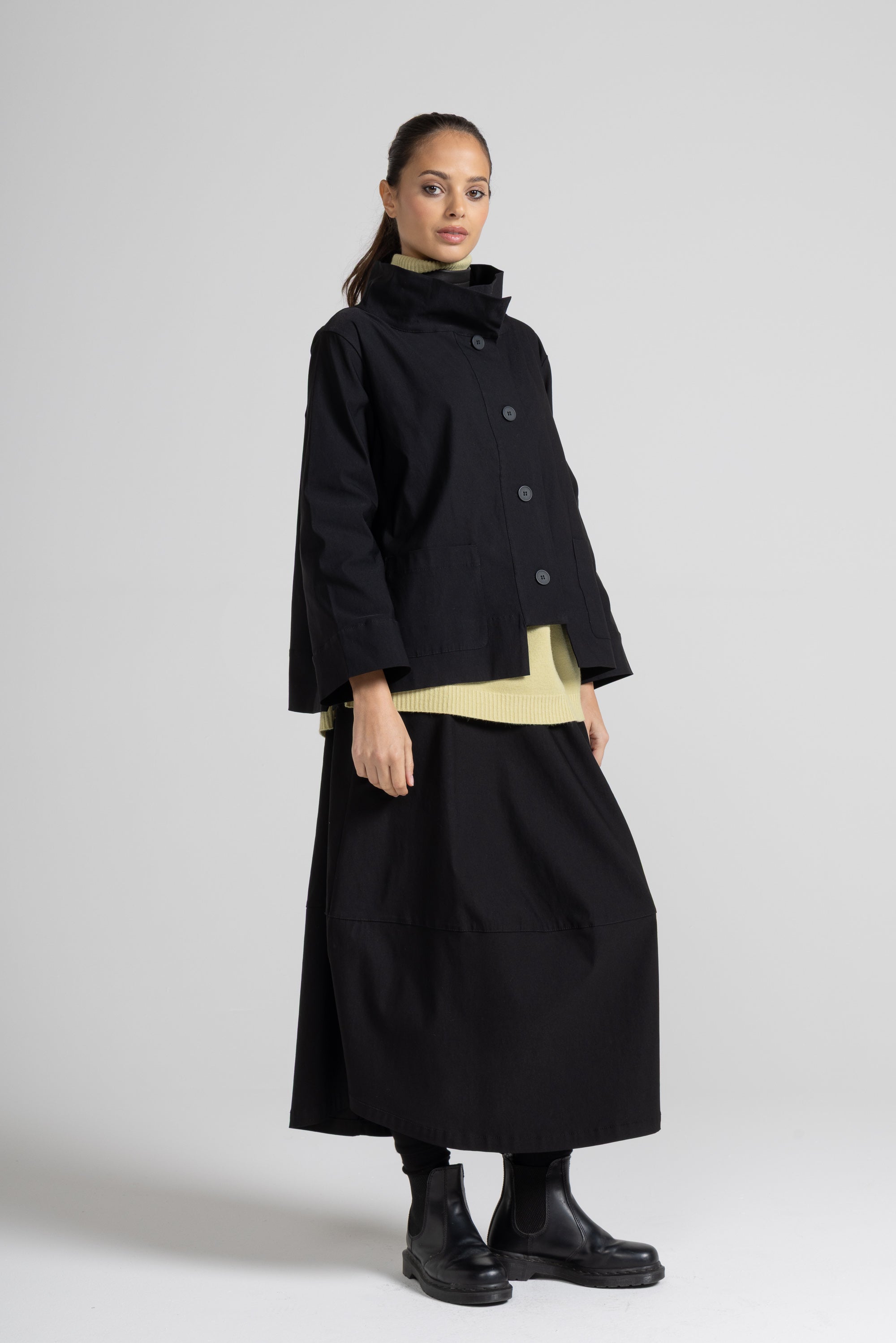 Women's navy asymmetric short jacket with long sleeves and button front closure