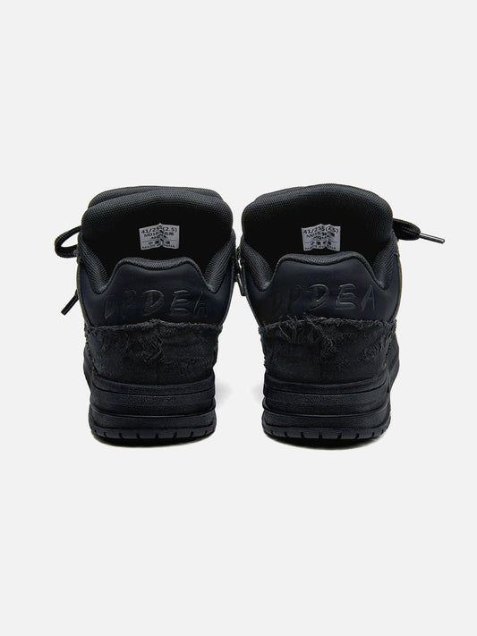 Black high-top sneakers with laces, camouflage side detail and rubber soles