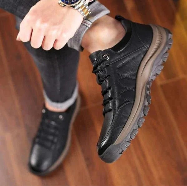 Men's black leather lace-up orthopedic shoes with cushioned midsole and treaded sole