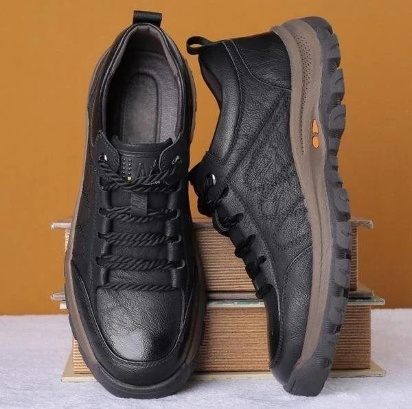 Men's black leather lace-up orthopedic shoes with cushioned midsole and treaded sole