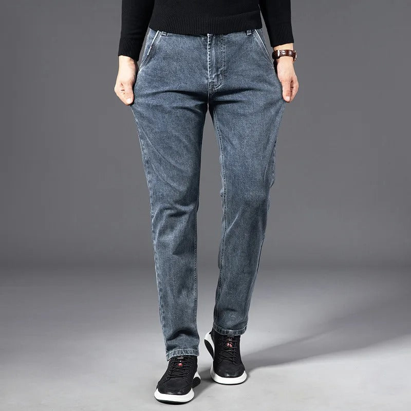 Men's slim straight-leg denim jeans with five-pocket design and belt loops