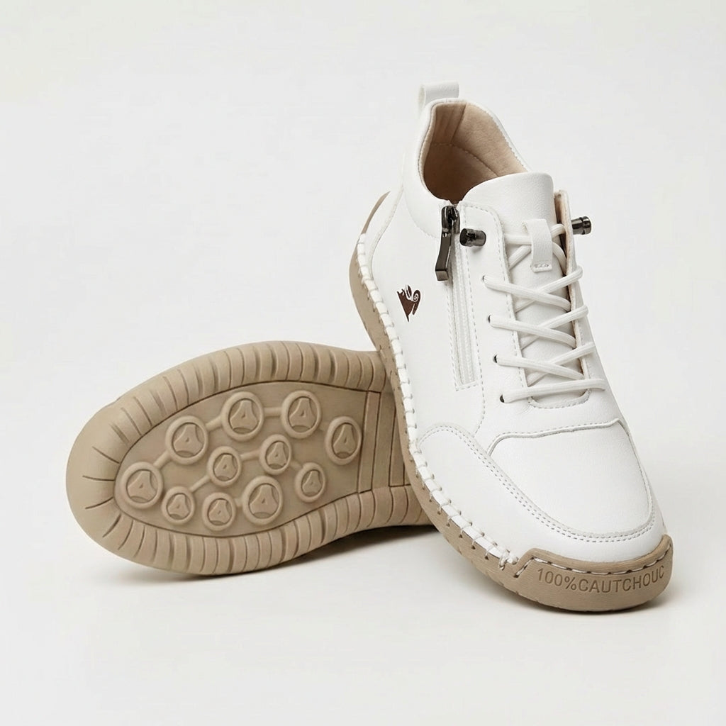 Lace-up ankle sneaker with side zip, shown in tan and pink colorways with padded collar
