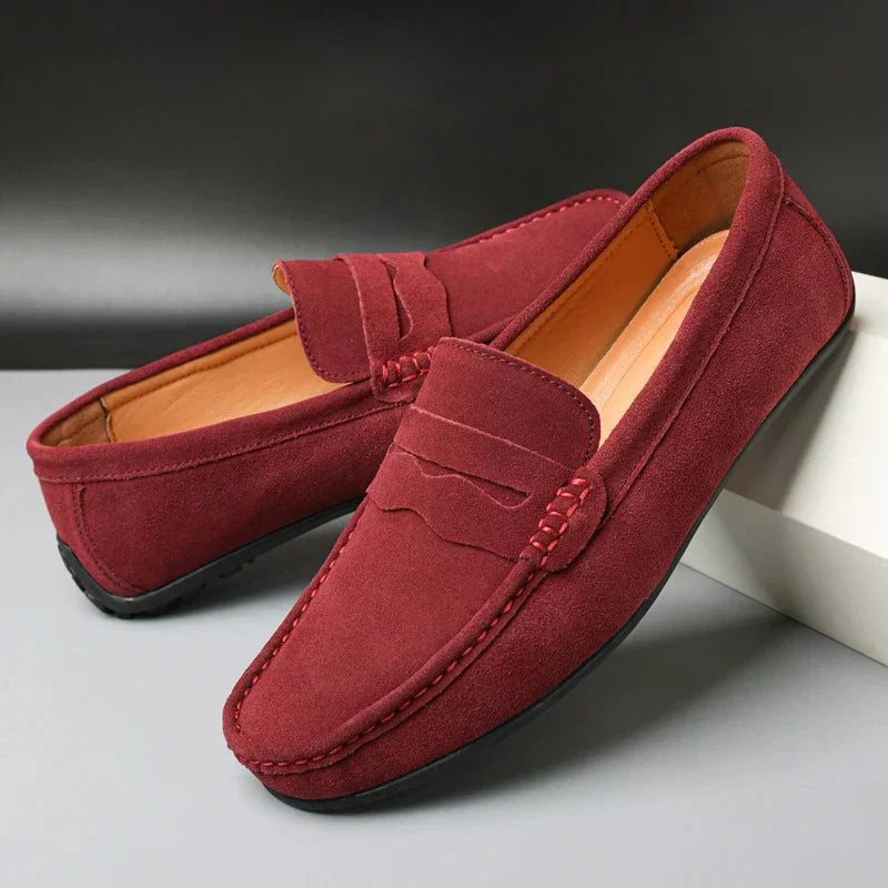 Men's penny loafers with moc toe stitching and slip-on design