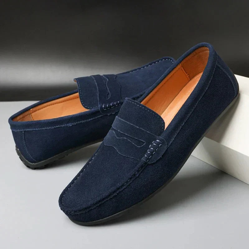Men's penny loafers with moc toe stitching and slip-on design
