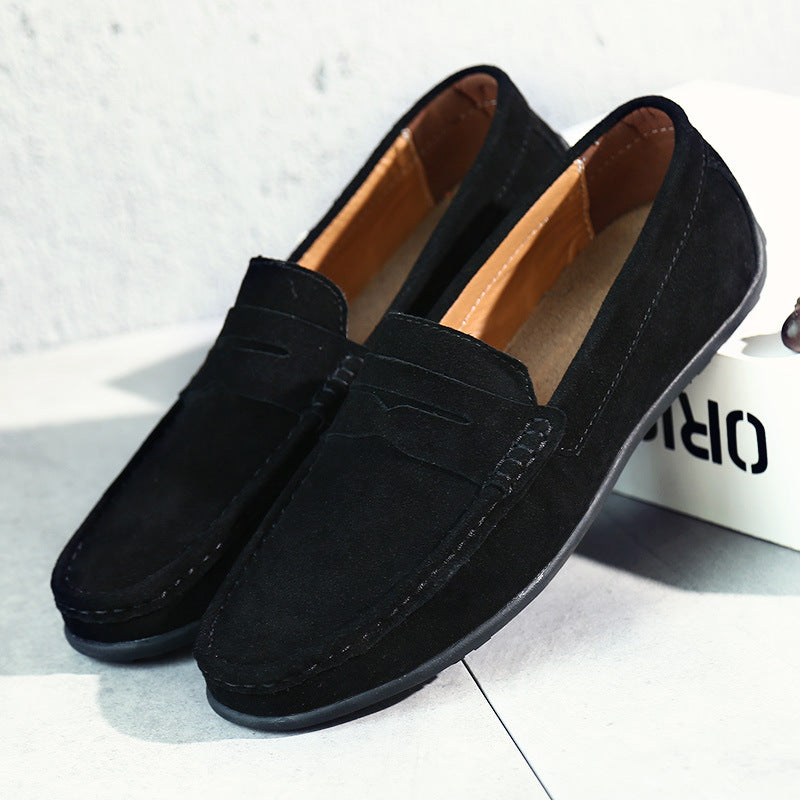 Men's penny loafers with moc toe stitching and slip-on design