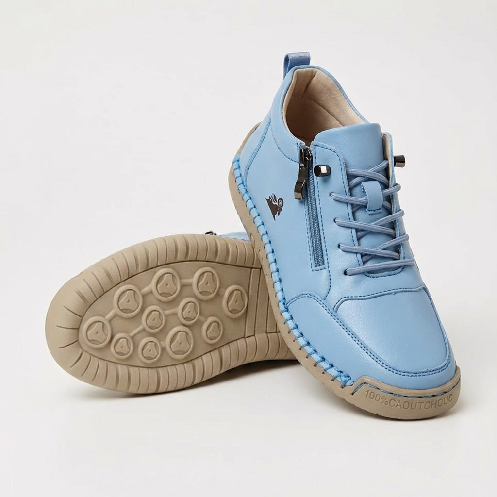 Lace-up ankle sneaker with side zip, shown in tan and pink colorways with padded collar