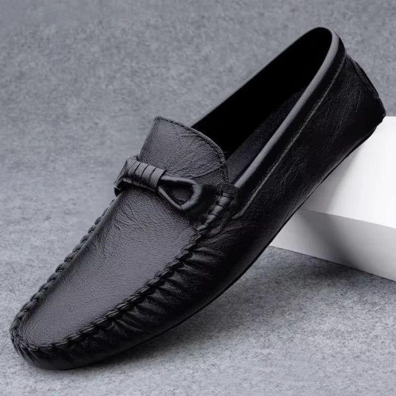 Unisex moccasin loafers with stitched toes and decorative knot detailing