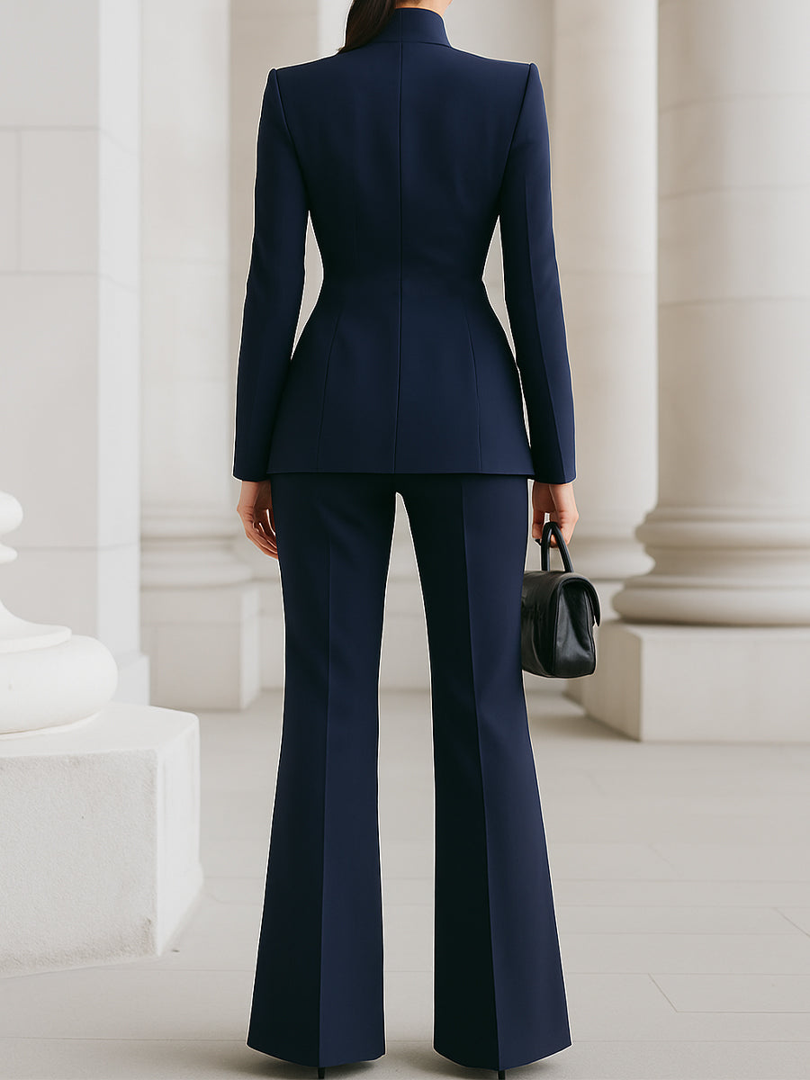Women's tailored blazer and wide-leg trouser suit set in navy and white, high collar