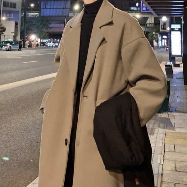 Men's long belted overcoat with notched lapels and side pockets