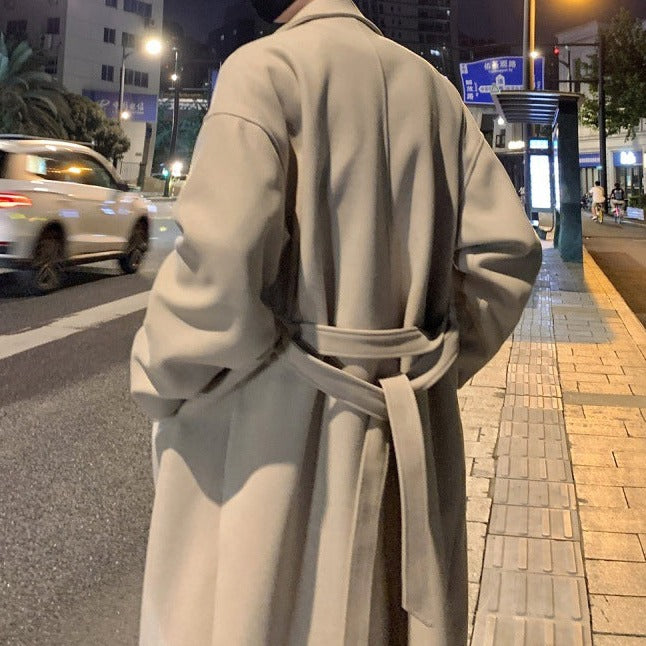 Men's long belted overcoat with notched lapels and side pockets