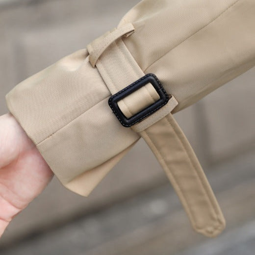 Men's long double-breasted trench coat with belt, buttoned pockets and checked lining