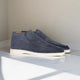 Men's slip-on loafers with stitched moccasin detailing and flat contrasting soles
