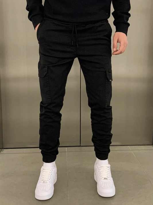 Men's tapered cargo trousers with drawstring waist, thigh pockets and elasticated cuffs