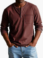 Men's long-sleeve Henley shirt with round neckline, button placket and chest pocket