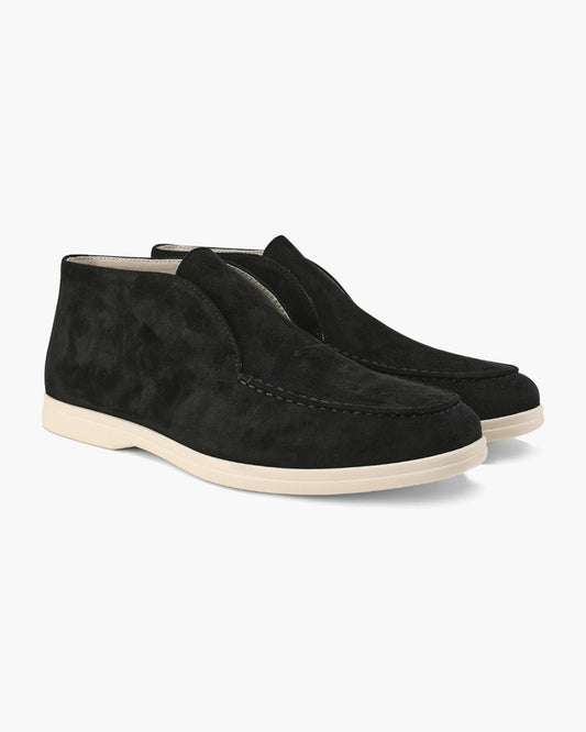 Unisex ankle-height slip-on loafers with rounded moc toes and stitched apron details
