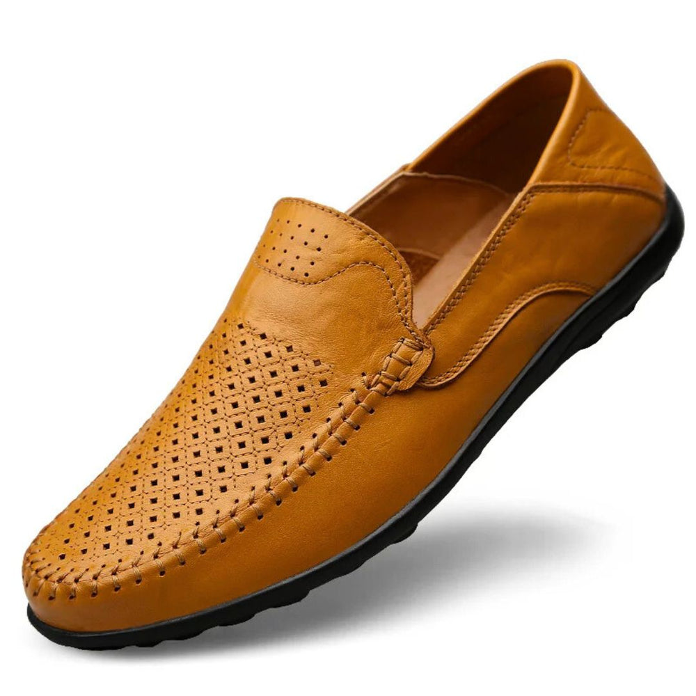 Perforated slip-on loafers with moc toe and flat treaded sole