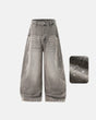 Light grey washed barrel-leg jeans with rhinestone embellishments