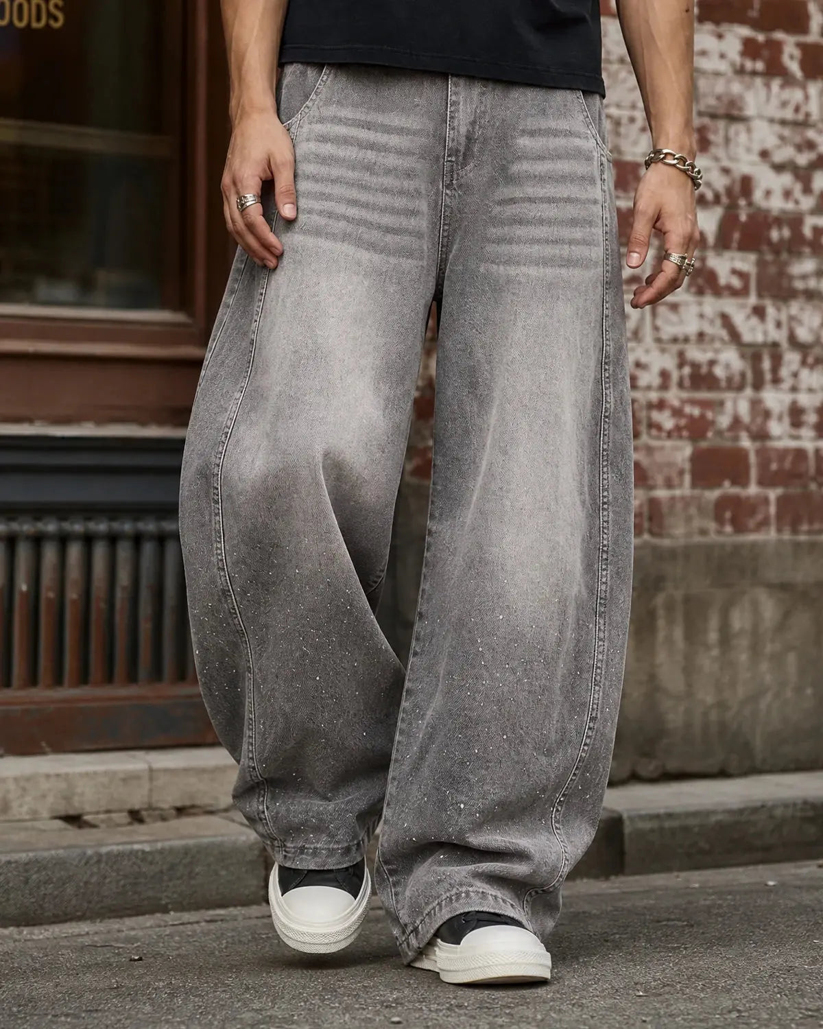 Light grey washed barrel-leg jeans with rhinestone embellishments