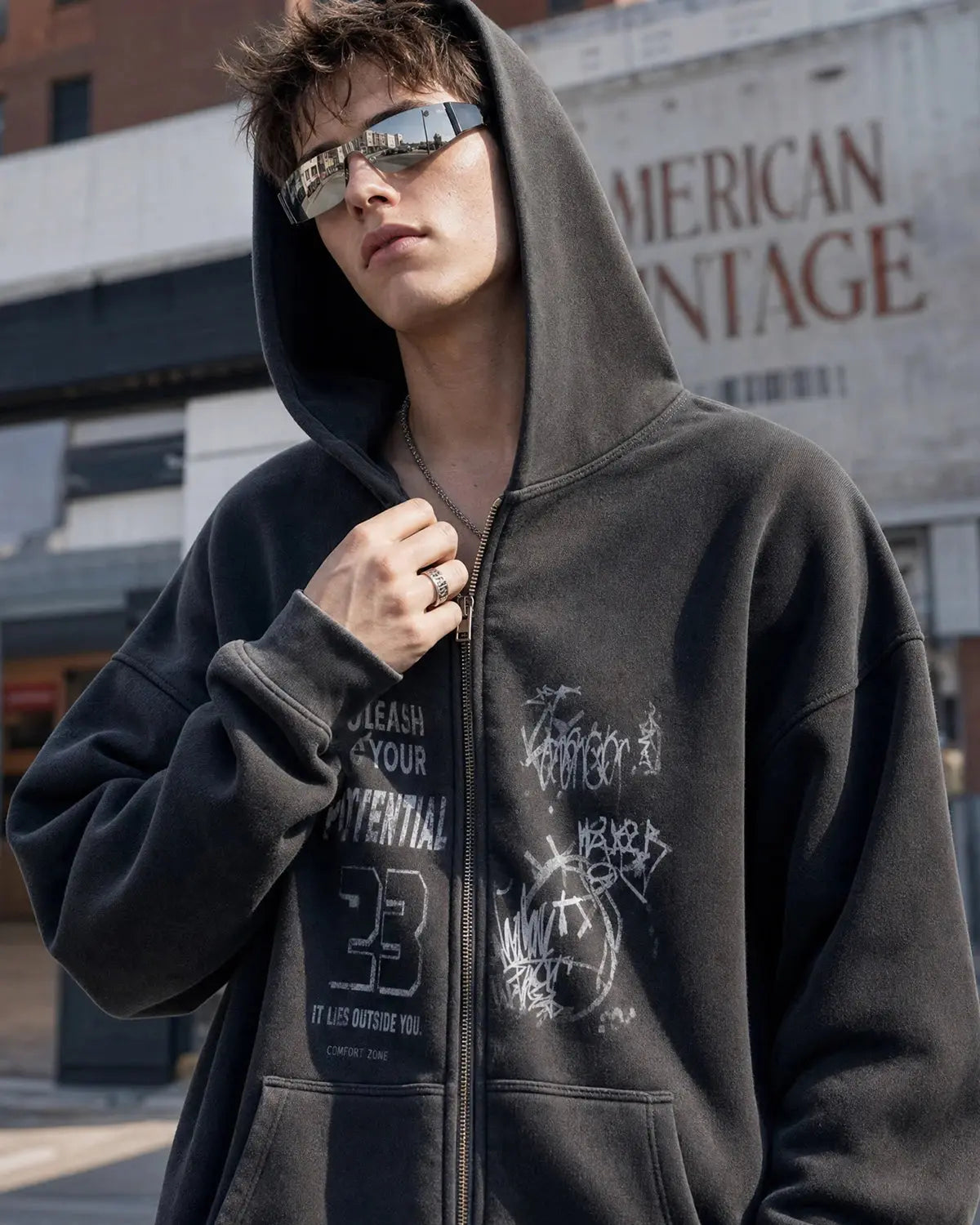 Graphic zip-up hoodie with hood, long sleeves and front pouch pockets