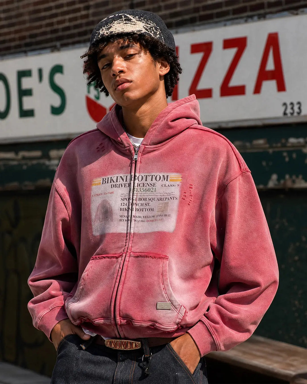 Unisex graphic zip-up hoodie with hood, printed chest design and front pockets