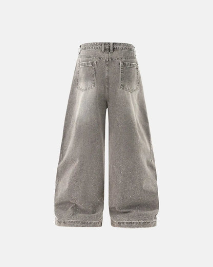 Light grey washed barrel-leg jeans with rhinestone embellishments
