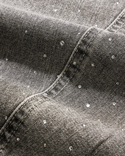 Light grey washed barrel-leg jeans with rhinestone embellishments
