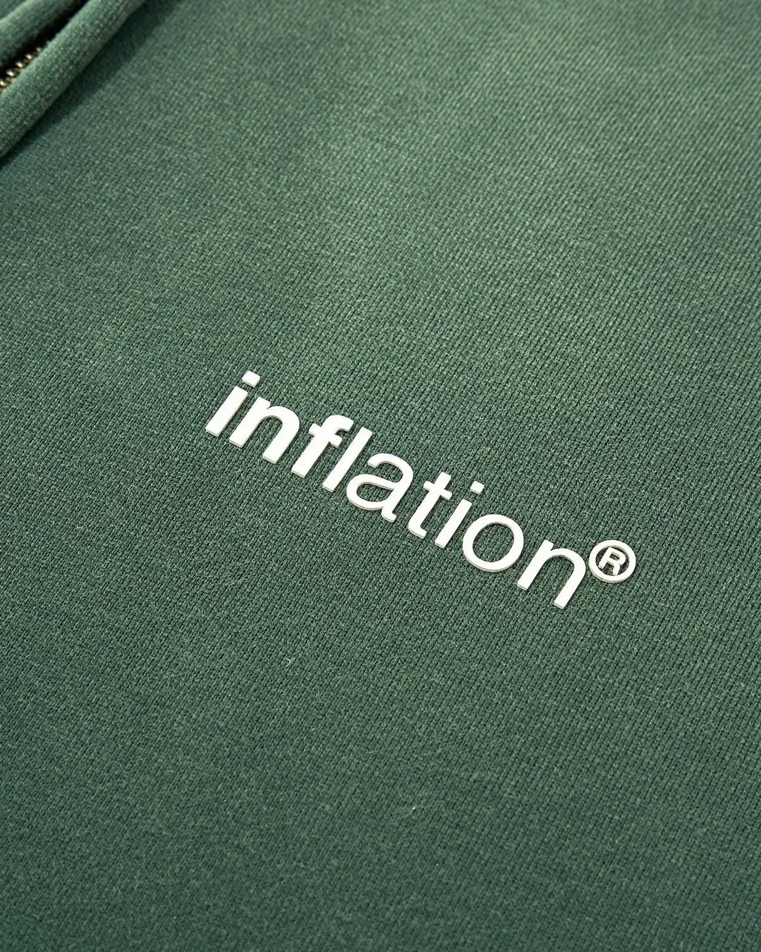 Green unisex zip-up hoodie with hood, long sleeves and front pouch pockets