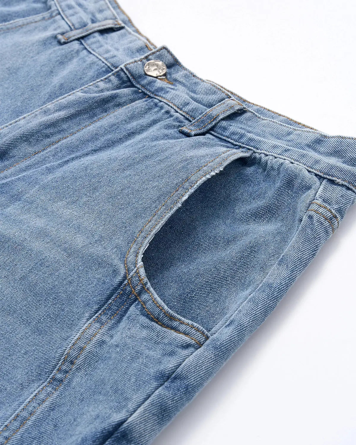 Light blue barrel-leg jeans with black script graphic and five-pocket design