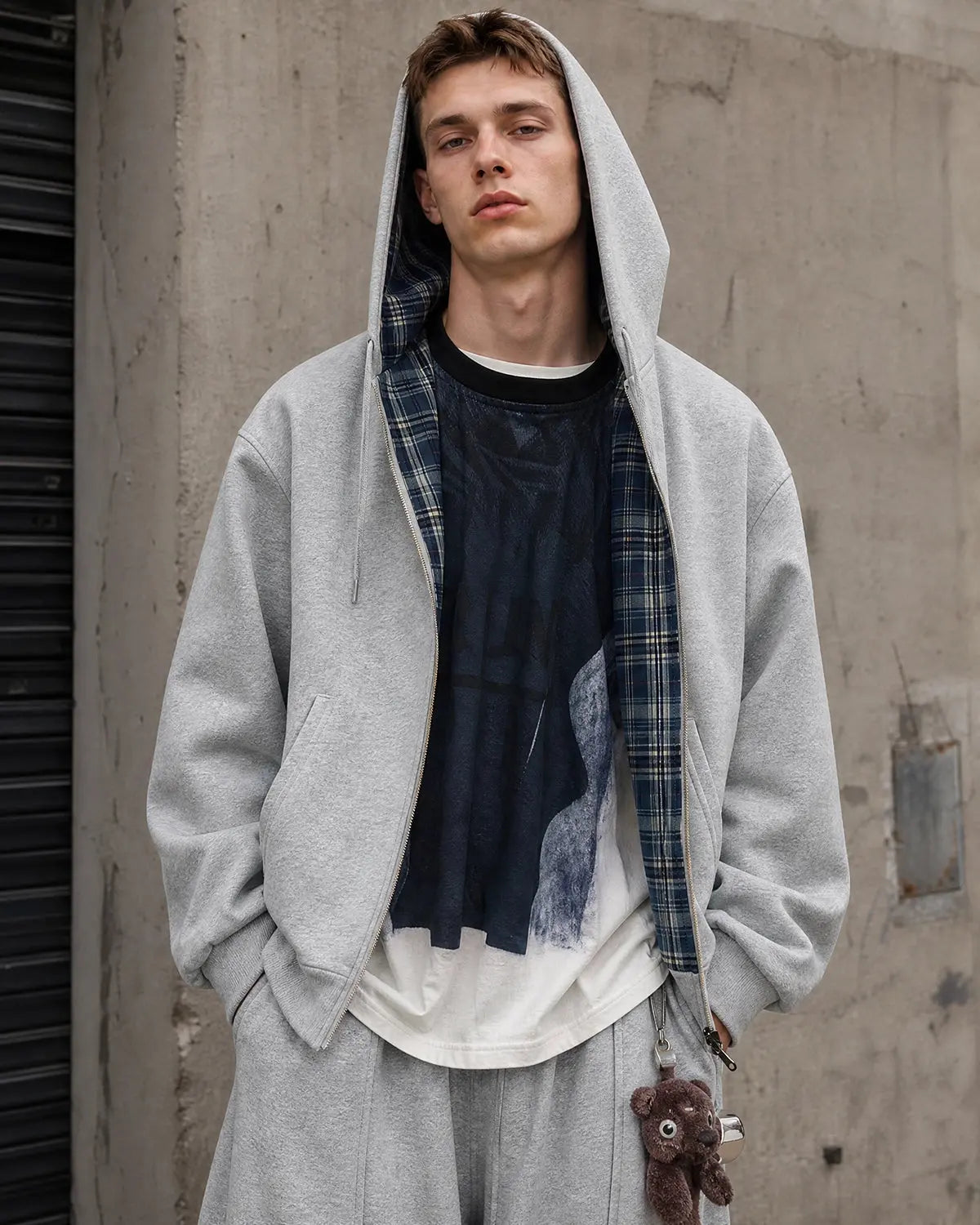 Grey reversible cropped hoodie with checked lining, hood and zip front