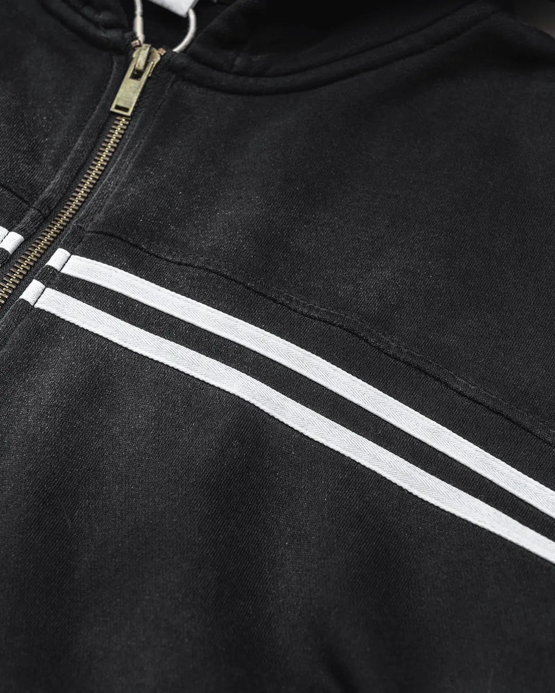 Black acid wash zip-up hoodie with white chest and sleeve stripes