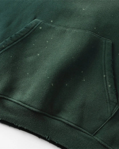 Unisex acid-washed hoodie with splatter detailing, long sleeves and kangaroo pocket