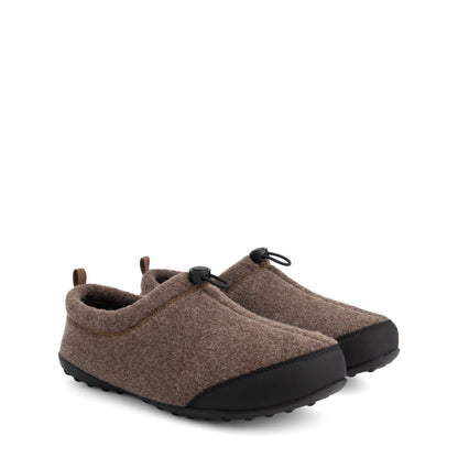 Brown house slippers with black toe panels, toggle closures and flat textured soles