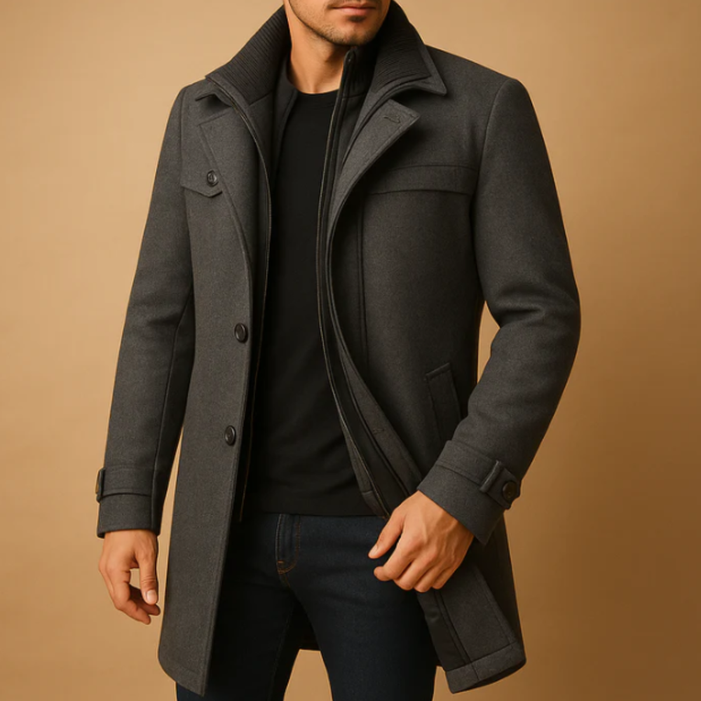 Men's structured winter coat with high collar, button and zip front, pockets and adjustable cuffs